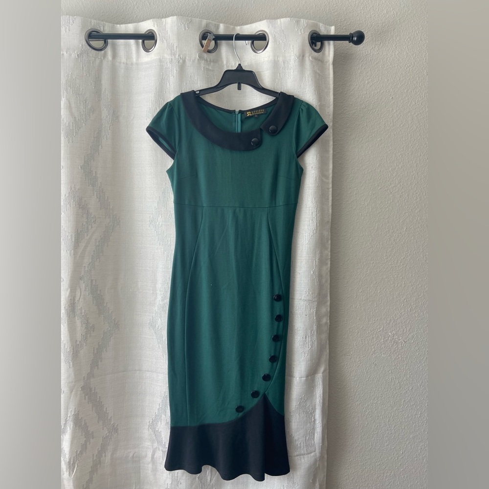 Long green elegant dress.